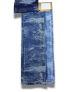 12 Oz Camouflaged Jacquard Denim Fabric sample showing faded wash effects and stitching details, SKU PRD-3.