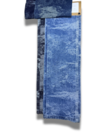 12 Oz Camouflaged Jacquard Denim Fabric sample showing faded wash effects and stitching details, SKU PRD-3.